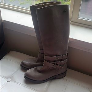 Tan tall leather boots with buckles